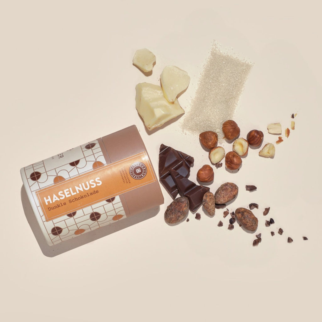 Dose Haselnuss Dunkle Schokolade mit Zutaten: Haselnüsse, Kakaobohnen, Kakaobutter, Zucker, Schokolade