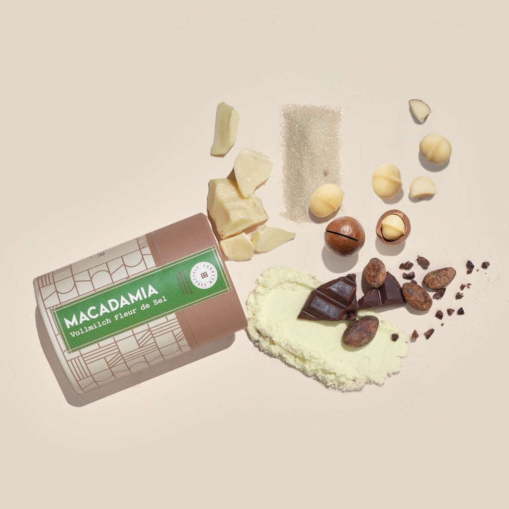Dose Macadamia Vollmilch Fleur de Sel mit Zutaten: Macadamianüsse, Kakaobohnen, Kakaobutter, Milchpulver, Zucker, Schokolade