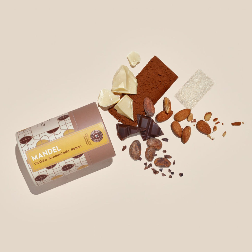 Dose Mandel Dunkle Schokolade Kakao mit Zutaten: Mandeln, Kakaobohnen, Kakaobutter, Kakaopulver, Zucker, Schokolade