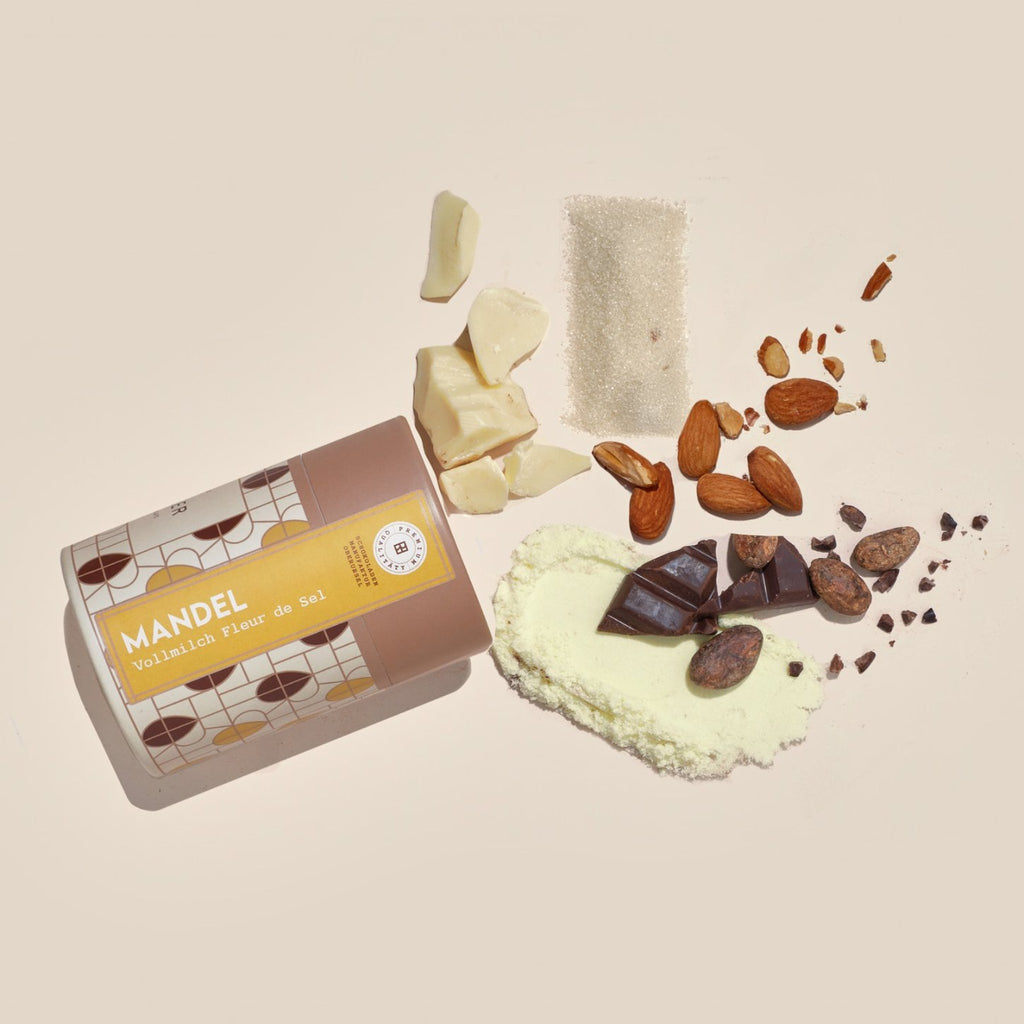 Dose Mandel Vollmilch Fleur de Sel mit Zutaten: Mandeln, Kakaobohnen, Kakaobutter, Milchpulver, Zucker, Schokolade